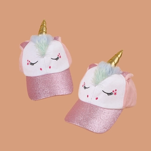 Pink unicorn kids baseball cap with sequins and gold horn in a dual-perspective view