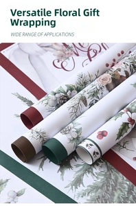 Detail of Christmas wrapping paper rolls with festive deer and pine needle patterns