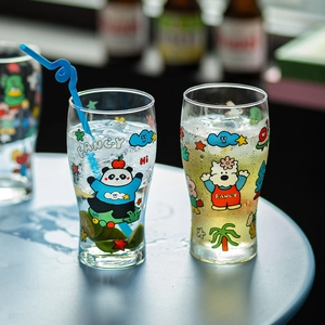 Cute panda and bear glass beer mugs with ice and lime slices in a professional setting