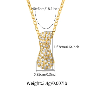 Macro detail of gold-plated necklace with bow pendant dimensions and chain length