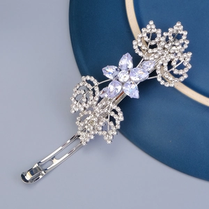 Macro shot of sparkling floral rhinestone hair clip with exquisite metal craftsmanship