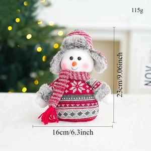 Detailed view of 23cm red Nordic knit snowman doll with soft plush texture and holiday trim