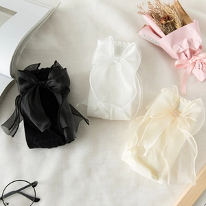 Three pairs of elegant mesh bow lace socks in black, white, and beige colors
