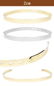 Detailed close-up of 2cm wide gold and silver metallic belts with adjustable buckle holes