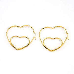 Fashionable gold double hollow heart drop earrings for women with minimalist metal design