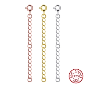 Detail of S925 sterling silver extension chains showing 925 hallmarks in three colors