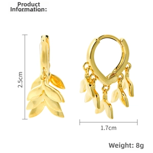 Detail view of gold hoop earrings showing 2.5cm height and tassel leaf design
