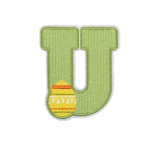 Easter embroidered letter U patch with green thread and yellow egg detail on white background