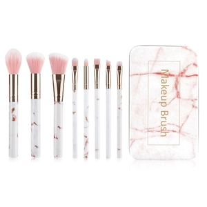8-piece marble makeup brush set with pink bristles and matching storage tin case