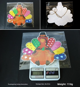 Detail view showing Thanksgiving turkey door sign with weight scale and packaging size