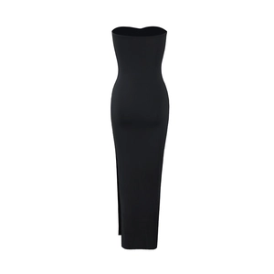Detailed side view of the sleek black strapless long dress with an elegant side slit