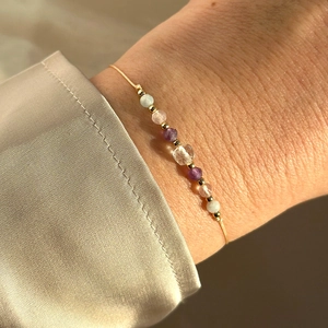 Adjustable natural stone bead bracelet with colorful gemstones and gold accents