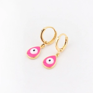 Gold hoop earrings featuring pink teardrop evil eye enamel charms on a white background