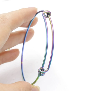 Macro shot of 1.6mm rainbow stainless steel wire bracelet with adjustable sliding nodes