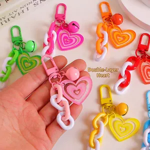 Creative double-layer heart keychain pendant with colorful bell and acrylic chain for bags