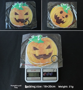 Detail of Halloween pumpkin banner set showing orange cards with ribbon and needle in package