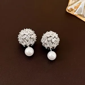 Silver bow flower heart earrings with zircon and white pearl in luxury design
