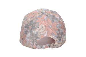 Detail of floral lace mesh texture and adjustable metal buckle on women's baseball cap