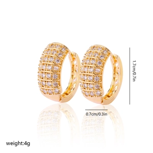 Detail view of gold hoop earrings with clear zircon pavé and 1.7cm size dimensions