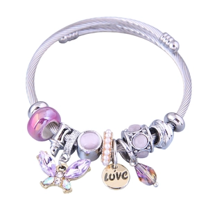 Stainless steel charm bracelet featuring purple butterfly pendant and LOVE beads on white