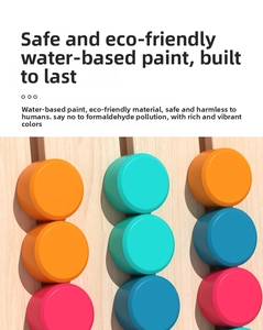 Macro detail of wooden Montessori toy with colorful sliders and eco-friendly water-based paint