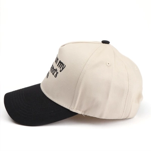 Detailed side view of contrast baseball cap with side embroidery and stitching