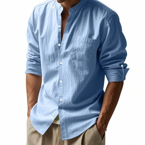 Detail of light blue linen shirt featuring a mandarin collar and single chest pocket