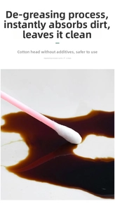 Macro view of absorbent cotton swab cleaning dark liquid, showing high suction capacity