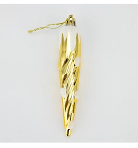Dettaglio di ornamento natalizio a spirale dorata con brillantini bianchi effetto neve