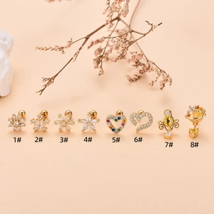 Set of 8 gold heart and star zirconia ear studs with vintage aesthetic for women