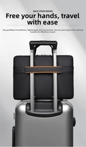 Detail of waterproof laptop bag showing back strap design for luggage handle attachment