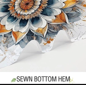 Detailed close-up showing the sewn bottom hem of the mandala pattern fabric shower curtain