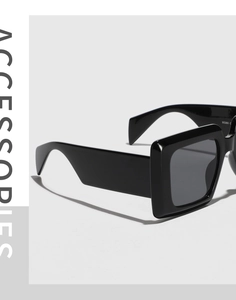 Detail shot of black square oversized sunglasses frames and polished temple design