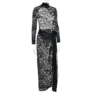 Detailed close-up of black lace high-neck maxi dress with elegant side slit and waist tie