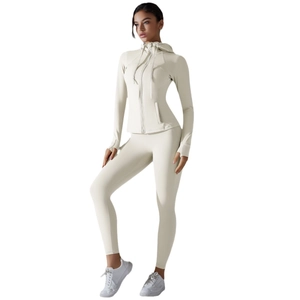 Set yoga da donna protettivo solare con giacca con cappuccio e leggings a vita alta bianco avena