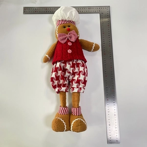 Detailed view of gingerbread man plush with ruler showing 60cm height dimension