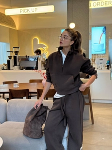Women's dark brown half-zip sweatshirt and matching joggers set in cafe street style