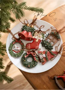 Detailed set of 6 vintage resin Christmas ornaments including bells and wreaths in a dish