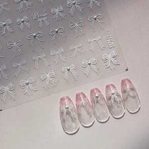 3D white bow and pearl nail stickers with relief texture for elegant DIY nail art designs