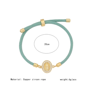 Detail of light green woven rope bracelet with 18K gold virgin Mary charm and dimensions
