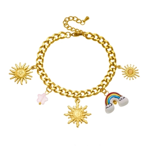 18K gold plated stainless steel bracelet with sun rainbow and star charms on white background