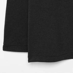Elegant black A-line skirt with minimalist knot design and high-quality stitched hem