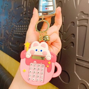 Pink cartoon rabbit calculator keychain with golden bell and silicone strap charm