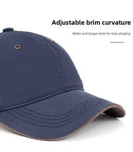 Close-up of navy baseball cap with foldable wide brim and metal eyelet details