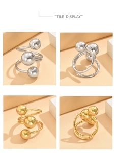 Détails de bagues spirales en or et argent ornées de trois perles métalliques polies