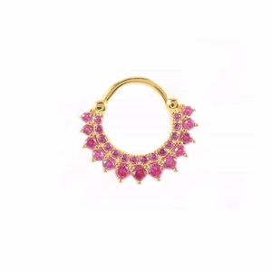 Detailed close-up of golden nose hoop with pink cubic zirconia stones in an arc shape