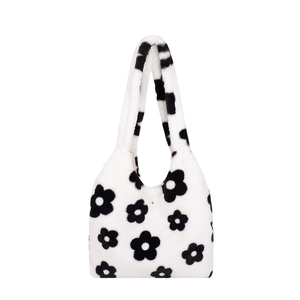 White plush shoulder bag featuring cute black floral patterns for women's winter fashion