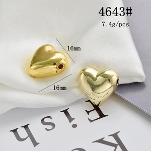 Detailed view of gold-tone heart pendant showing dimensions 16mm by 16mm for jewelry making