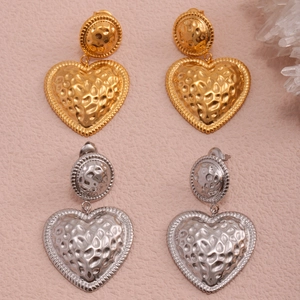 Textured heart-shaped dangle earrings in gold and silver finish with hammered metal details