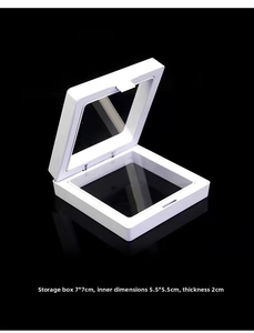 Detail view of a 7x7cm white PE film jewelry display box with clear suspension windows